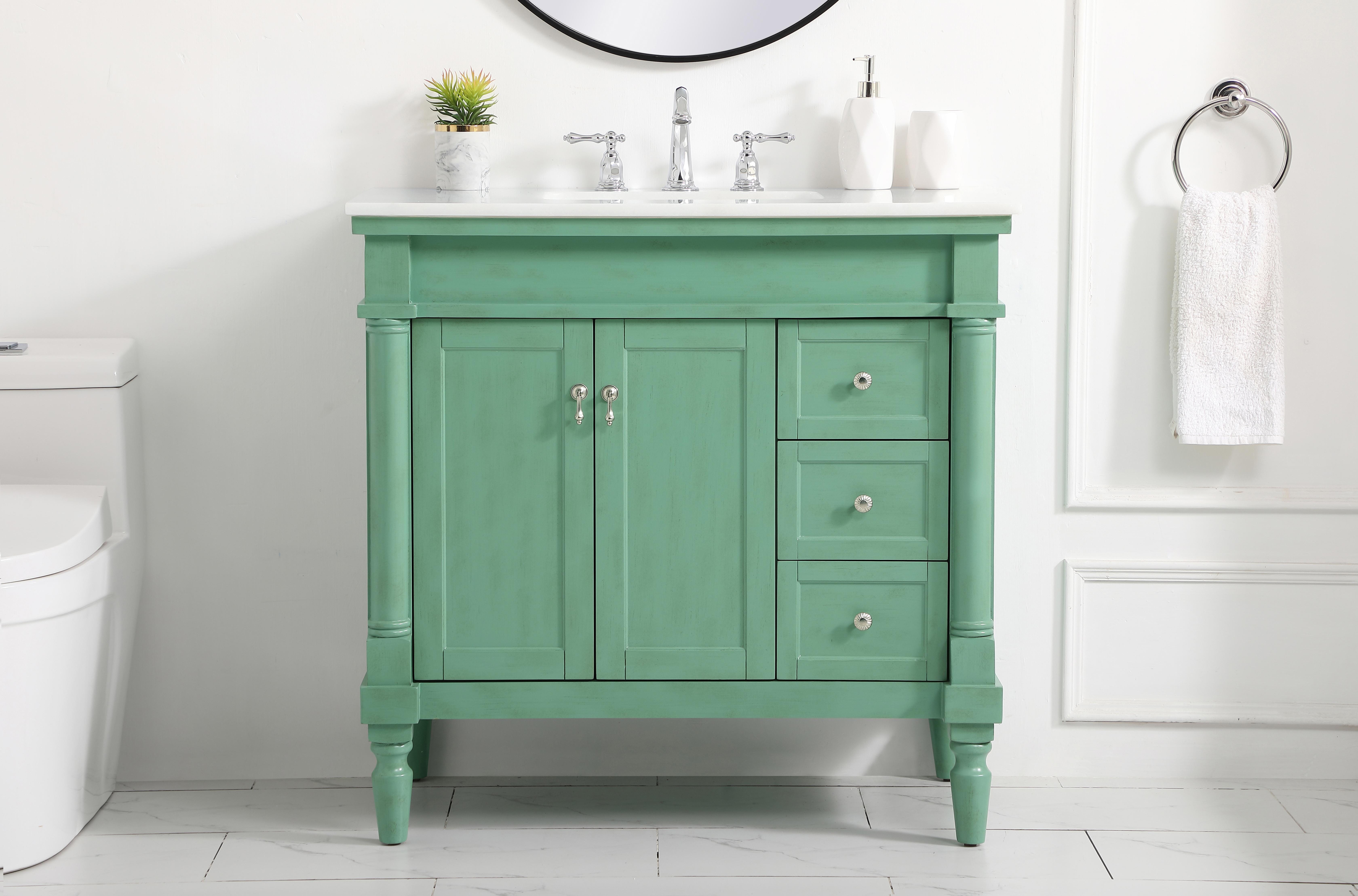 Dimensions
Length: 36"
Width: 21.5"
Height: 35"
Counter Top Length: 36"
Counter Top Width: 21.5"
Counter Top Height: 0.75"
Sink Width: 15.25"
Sink Depth: 11"
Sink Height: 7"
Sink Drain Hole Size: 1.75"
Faucet Hole Spacing: 8"3 Holes"
Specifications
Assembly Required: YES
Base Material: Solid wood and MDF
Counter Top Edge Style: straight
Counter Top Finish: Ivory white
Distressed Finish: Yes
Finish (Color): Vintage Mint
Fixture Material: Solid Wood and MDF
Hardware Finish: Brushed nickel
Harware Material: Aluminum alloy
Number of Faucet Holes: 3
Number of Sinks: 1
Product Shape: Rectangle
Product Type: Bathroom Vanities
Product Warranty: 1 year limited
Sink Mounting Type: Undermount
Vanity Backsplash: NO
Vanity Mounting Type: Free-Standing
Weight: 125
Wire Included: No
Wood Type: birch
Shipment type: LTL
US Shipping Cost: $162.00
Drawers
Drawers Included: yes
Number of Drawers: 3
Drawer Width: 9.375
Drawer Depth: 14
Drawer Height: 6.375
Drawer Handle Designs: knobs
Shelves
Number of Shelves: 1
Shelf Width: 19.625
Cabinets
Number of Cabinets: 1
Cabinet Interior Width: 19.625
Cabinet Interior Depth: 16.675
Cabinet Interior Height: 19 - alternate view