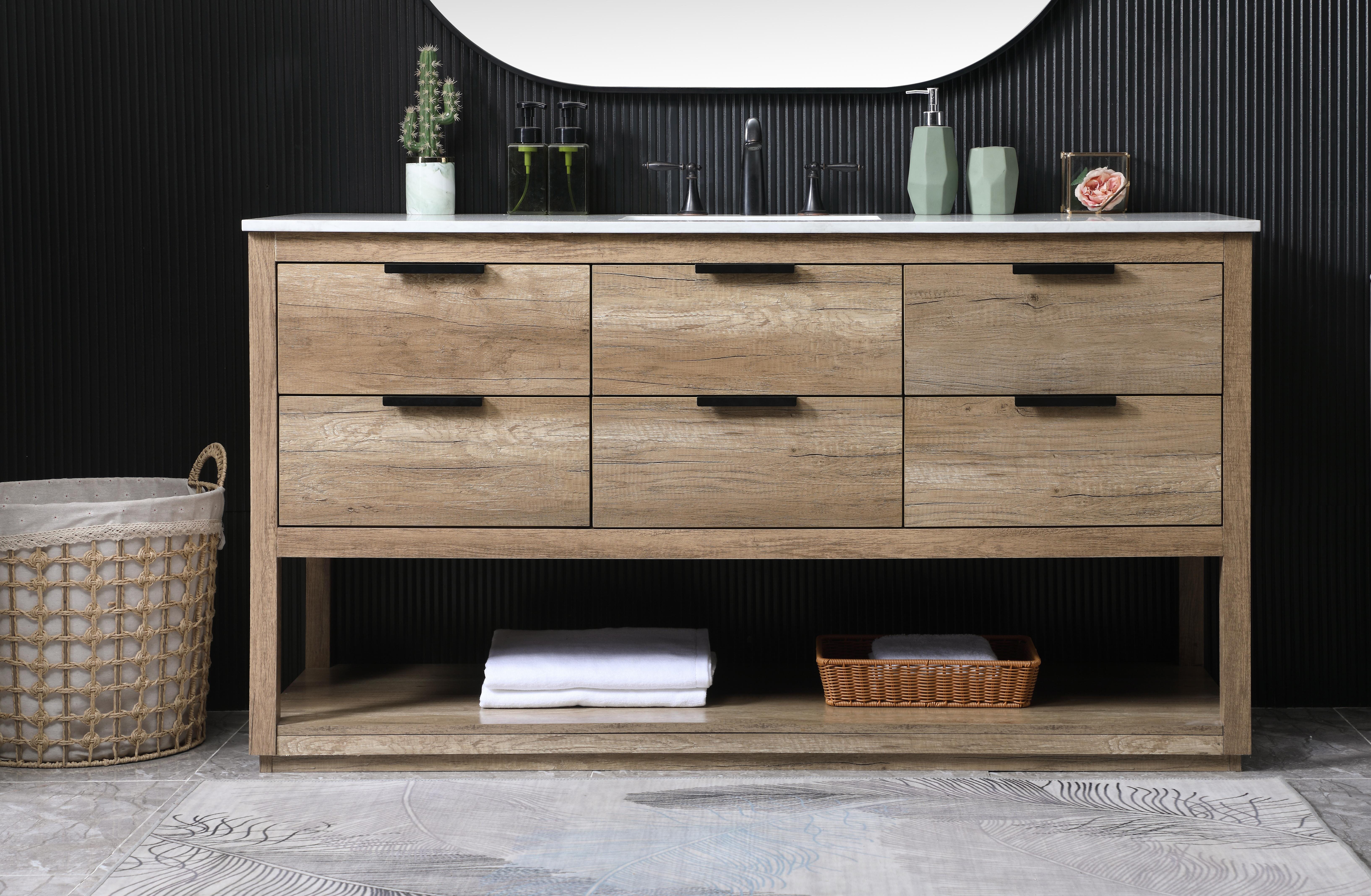 Elevate your bathroom effortlessly with our stylish vanity. Featuring an engineered marble top and chic straight edge cut, it brings a touch of modern elegance. The soft-close drawers, adorned with sleek pulls, offers both convenient storage and a contemporary aesthetic. Completing the ensemble, an undermount porcelain sink adds timeless charm. The vanity's open shelf at the bottom provides extra storage and a space to showcase decor. As a freestanding unit, this hassle-free solution requires no assembly. Customize your space effortlessly with this sophisticated option for instant bathroom elegance. Collection: Larkin Rooms: bathroom Finish: Natural Oak Width: 22.00" Height: 34.00" Length: 60.00" Weight: 216.00 lb Material: Solid wood and MDF Country of Origin: Vietnam Manufacturer Warranty: 1 year limited - alternate view