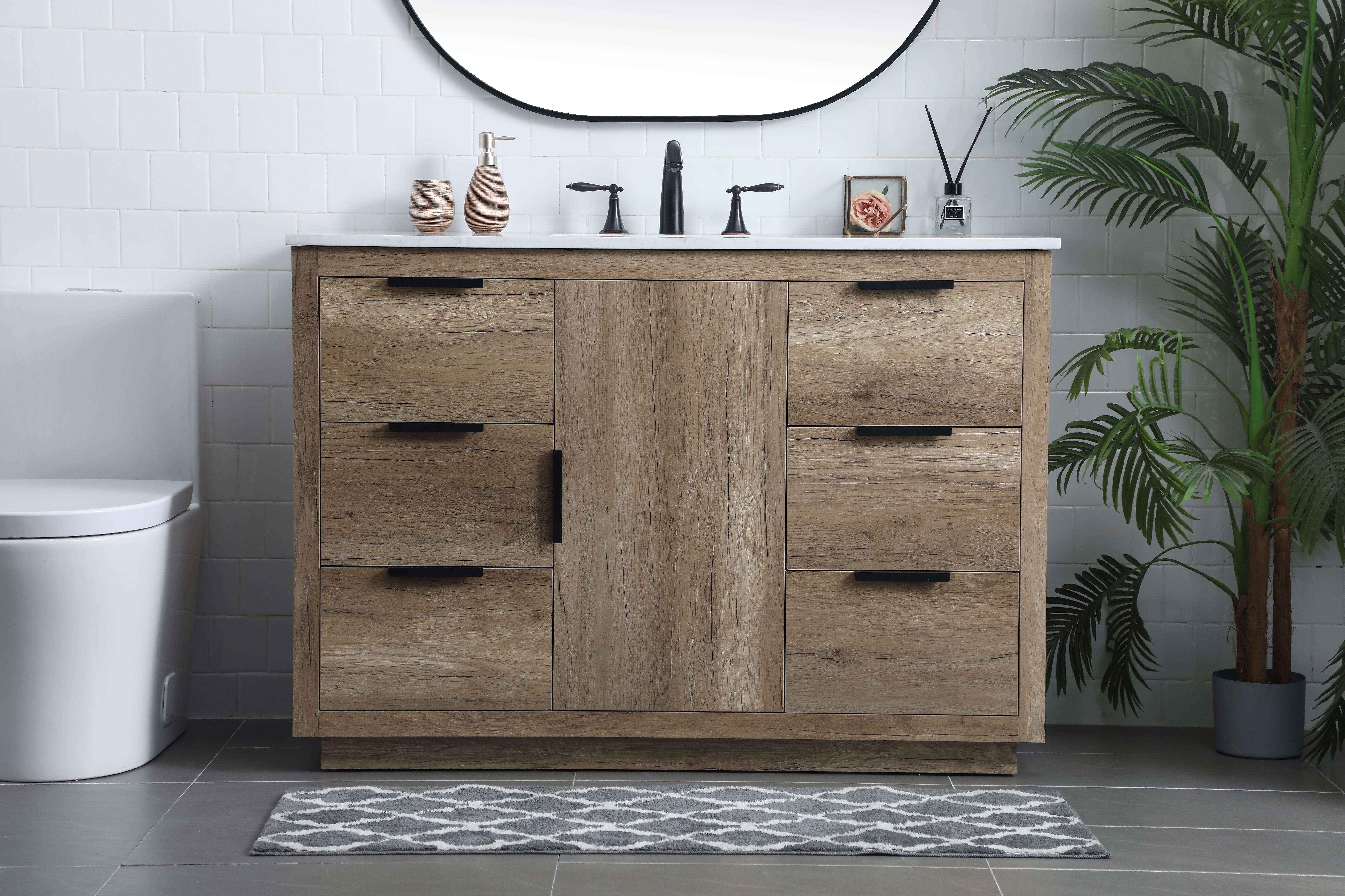 Dimensions
Length: 48"
Width: 22"
Height: 34"
Depth: 22"
Counter Top Length: 48"
Counter Top Width: 22"
Counter Top Height: 0.7"
Sink Width: 16.1"
Sink Depth: 11"
Sink Height: 7.875"
Sink Drain Hole Size: 1.77"
Faucet Hole Spacing: 8 inch"
Specifications
Assembly Required: NO
Base Material: MDF
Counter Top Edge Style: Straight
Counter Top Finish: Calacatta white
Distressed Finish: NO
Drain Assembly Included: NO
Faucet Included: NO
Finish (Color): Natural Oak
Vanity Material: Solid Wood and MDF
Hardware Finish: Black
Harware Material: Aluminium alloy
Number of Faucet Holes: 3
Number of Sinks: 1
Product Shape: Rectangle
Product Type: Bathroom Vanities
Product Warranty: 1 year limited
Sink Mounting Type: Undermount
Vanity Backsplash: NO
Vanity Mounting Type: Free-Standing
Weight: 205
Wire Included: No
Wood Type: Rubberwood
Shipment type: LTL
US Shipping Cost: $221.00
Drawers
Drawers Included: Yes
Number of Drawers: 6
False Drawers: NO
Drawer Width: DW1:14.5
DW2:14.5
Drawer Depth: DW1:14
DW2:14
Drawer Height: DW1:9
DW2:9
Drawer Handle Designs: Finger pulls
Shelves
Number of Shelves: 1
Shelf Width: 14.5
Cabinets
Number of Cabinets: 1
Cabinet Interior Width: 14.5
Cabinet Interior Depth: 20.6
Cabinet Interior Height: 27.3 - alternate view