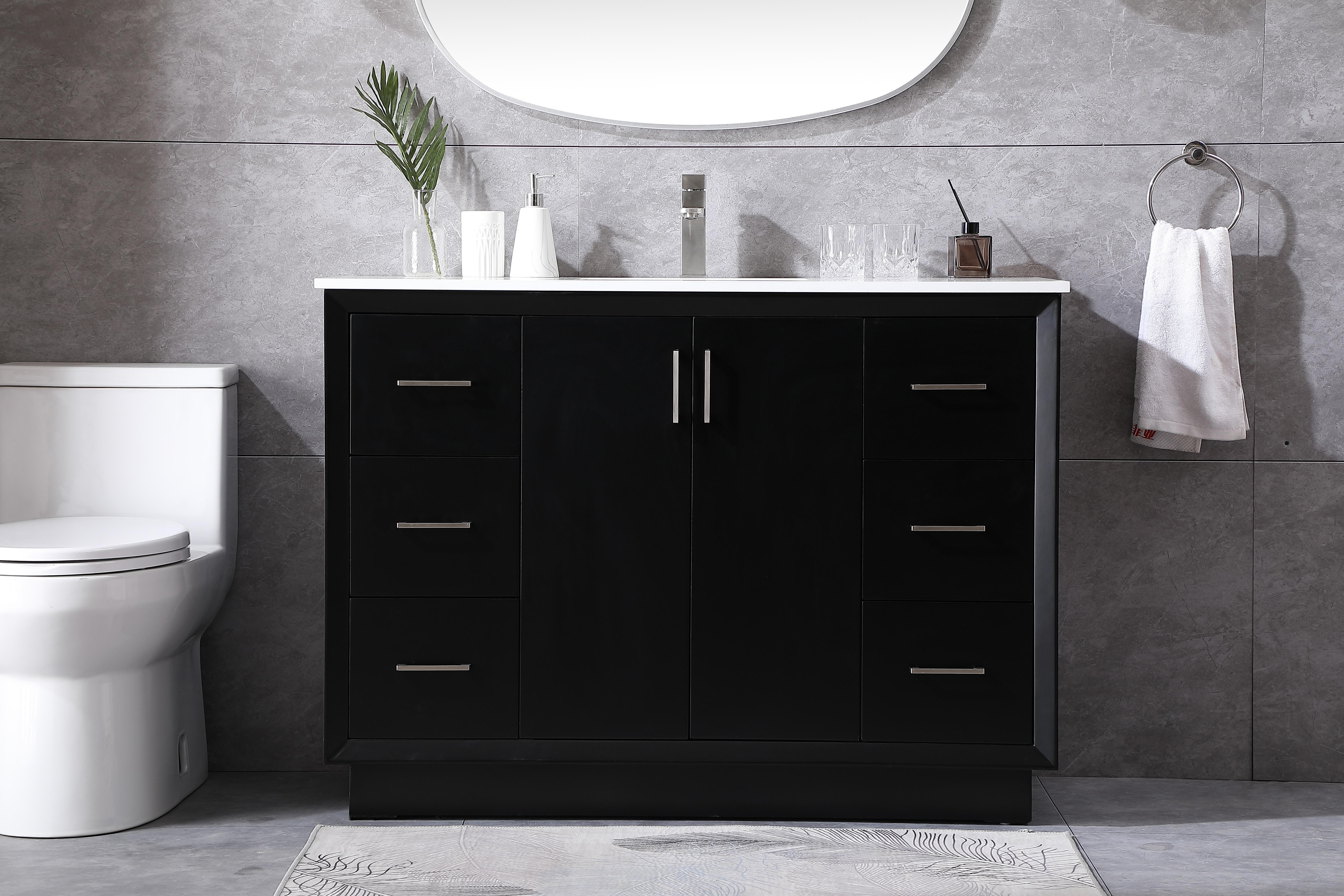 Dimensions
Length: 48"
Width: 22"
Height: 35"
Counter Top Length: 48"
Counter Top Width: 22"
Counter Top Height: 0.75"
Sink Width: 15.35"
Sink Depth: 10.83"
Sink Height: 7"
Sink Drain Hole Size: 1.75"
Faucet Hole Spacing: Single Hole"
Specifications
Assembly Required: NO
Base Material: solid wood
Counter Top Edge Style: straight
Counter Top Finish: calacatta white
Distressed Finish: no
Drain Assembly Included: No
Faucet Included: No
Finish (Color): Black
Vanity Material: Solid Wood and MDF
Hardware Finish: Brushed nickel
Harware Material: Aluminum alloy
Number of Faucet Holes: 1
Number of Sinks: 1
Product Shape: Rectangle
Product Type: Bathroom Vanities
Product Warranty: 1 year limited
Sink Mounting Type: Undermount
Vanity Backsplash: NO
Vanity Mounting Type: Free-Standing
Weight: 229
Wire Included: No
Wood Type: Rubberwood
Shipment type: LTL
US Shipping Cost: $227.00
Drawers
Drawers Included: yes
Number of Drawers: 6
Drawer Width: 11
Drawer Depth: 14.88
Drawer Height: 9.2
Drawer Handle Designs: Bar pulls
Shelves
Number of Shelves: 1
Shelf Width: 22
17.72
Cabinets
Number of Cabinets: 1
Cabinet Interior Width: 22
Cabinet Interior Depth: 17.72
Cabinet Interior Height: 27.6 - alternate view