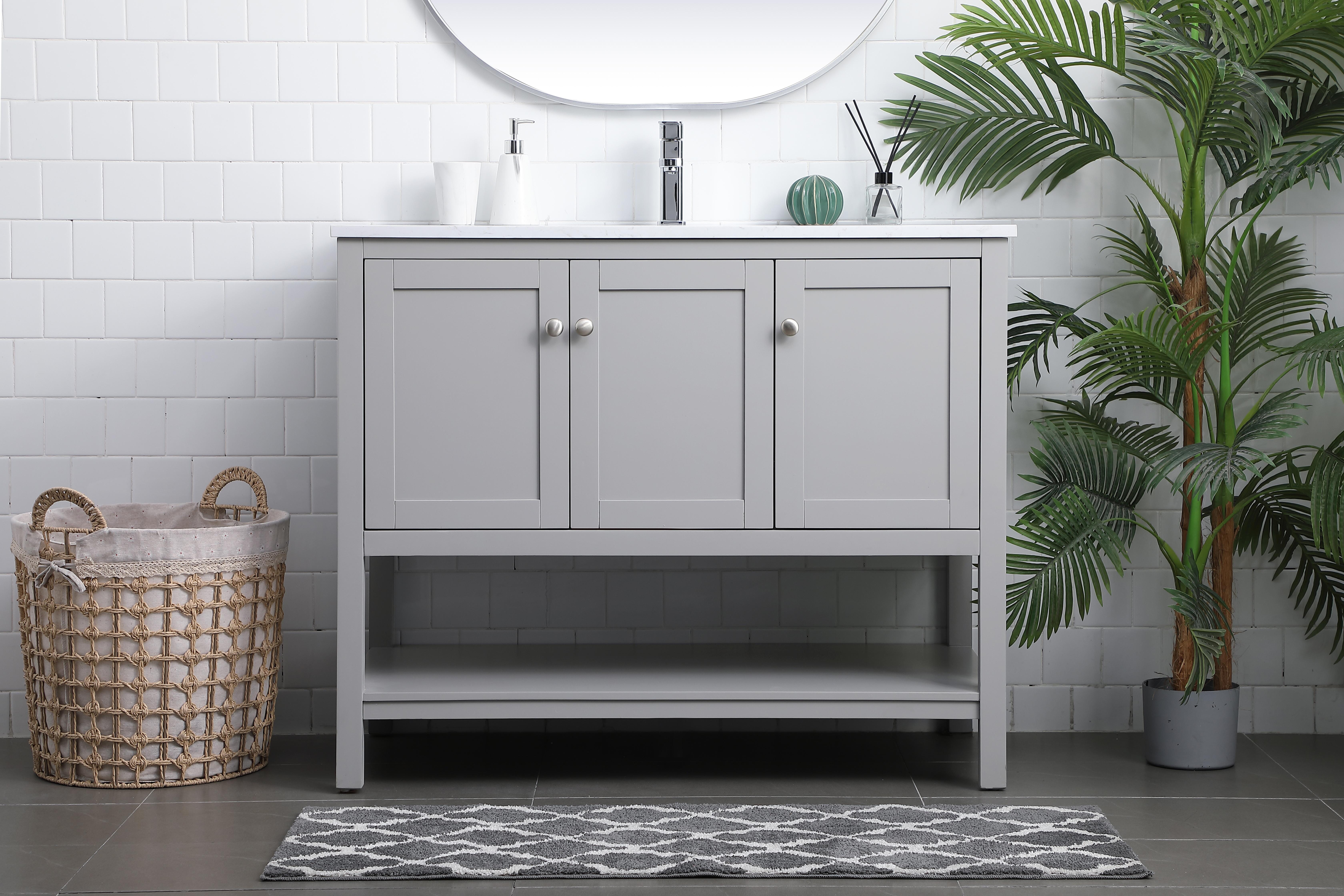 Dimensions
Length: 42"
Width: 21.5"
Height: 35"
Counter Top Length: 42"
Counter Top Width: 21.5"
Counter Top Height: 0.7"
Sink Width: 15.8"
Sink Depth: 10.9"
Sink Height: 7.875"
Sink Drain Hole Size: 1.77"
Faucet Hole Spacing: 1 Hole"
Specifications
Assembly Required: NO
Base Material: MDF
Counter Top Edge Style: Straight
Counter Top Finish: Calacatta white
Distressed Finish: NO
Drain Assembly Included: NO
Faucet Included: NO
Finish (Color): Grey
Vanity Material: Solid Wood and MDF
Hardware Finish: Brushed nickel
Harware Material: Aluminium alloy
Number of Faucet Holes: 1
Number of Sinks: 1
Product Shape: Rectangle
Product Type: Bathroom Vanities
Product Warranty: 1 year limited
Sink Mounting Type: Undermount
Vanity Backsplash: NO
Vanity Mounting Type: Free-Standing
Weight: 134
Wire Included: No
Wood Type: Rubberwood
Shipment type: LTL
US Shipping Cost: $189.00
Drawers
Drawers Included: NO
Number of Drawers: 0
Shelves
Number of Shelves: 1
Shelf Width: 37.625
17.5
Cabinets
Number of Cabinets: 2
Cabinet Interior Width: 25 ,12.375
Cabinet Interior Depth: 17.5,17.5
Cabinet Interior Height: 16.875,16.875 - alternate view