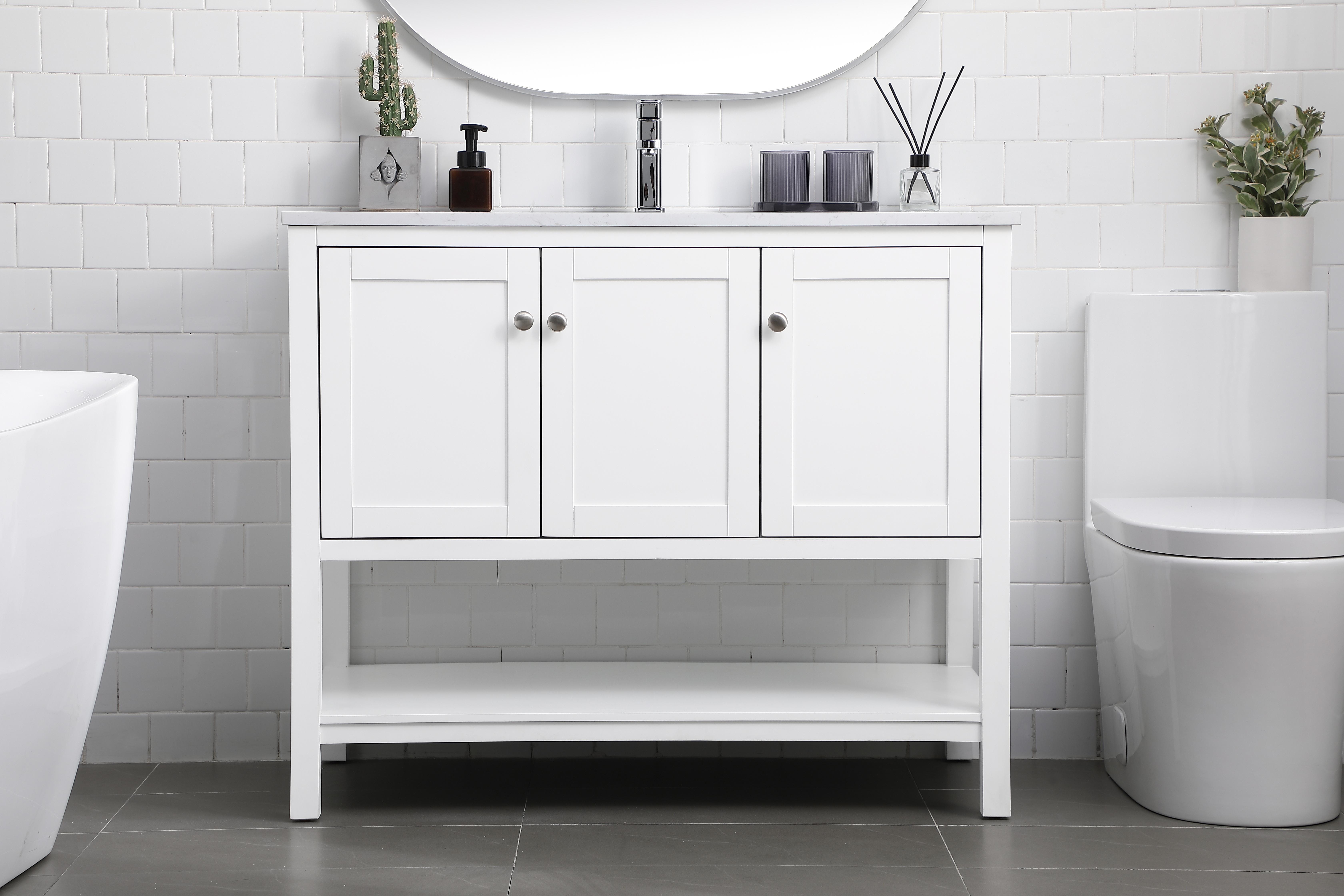 The Heath vanity delivers sophisticated transitional design with a clean white finish and solid wood construction. At 42 inches wide, it's perfectly sized for medium bathrooms while offering ample storage and counter space. - alternate view