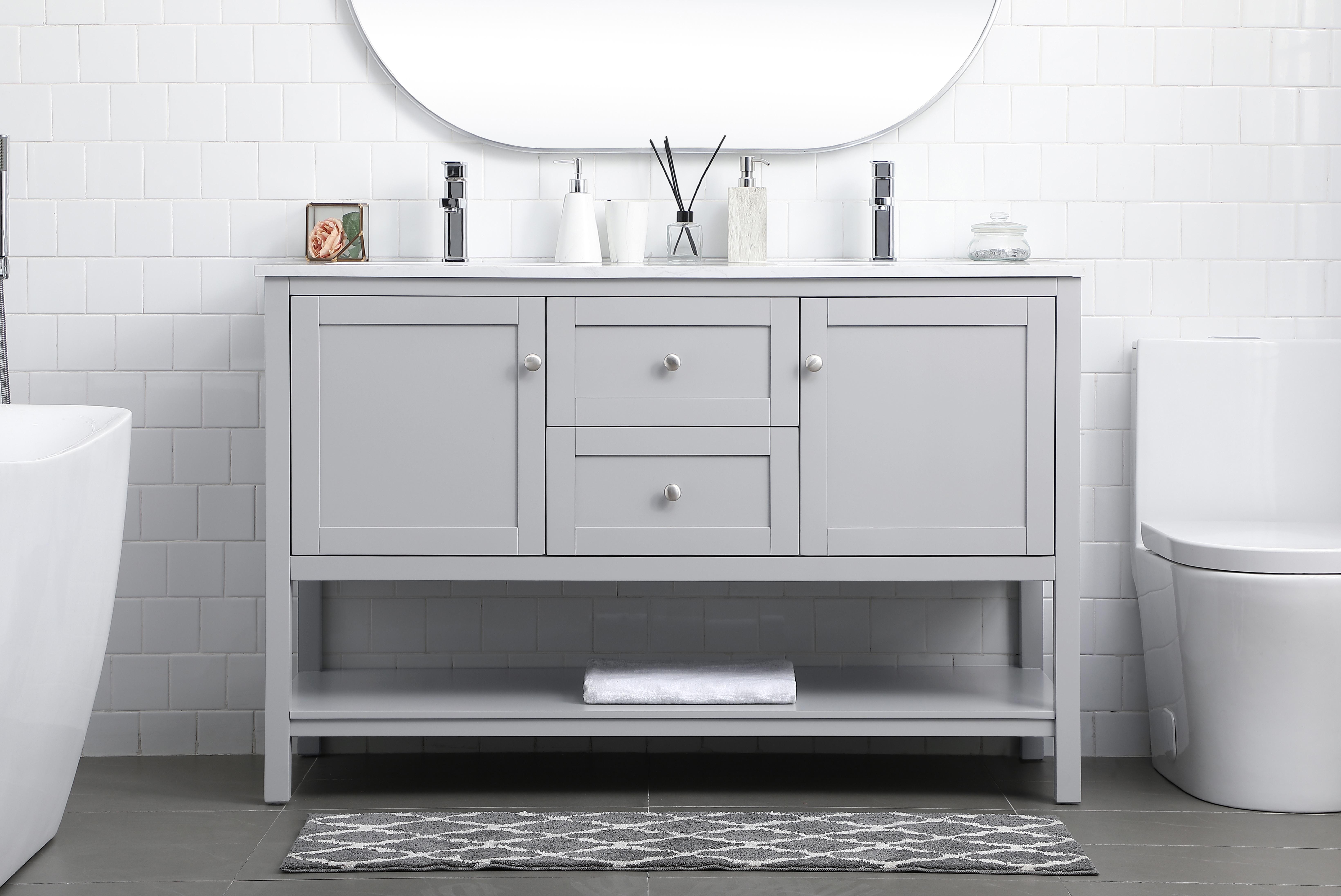 Dimensions
Length: 54"
Width: 21.5"
Height: 35"
Counter Top Length: 54"
Counter Top Width: 21.5"
Counter Top Height: 0.7"
Sink Width: 15.8"
Sink Depth: 10.9"
Sink Height: 7.875"
Sink Drain Hole Size: 1.77"
Faucet Hole Spacing: 1 Hole"
Specifications
Assembly Required: NO
Base Material: MDF
Counter Top Edge Style: Straight
Counter Top Finish: Calacatta white
Distressed Finish: NO
Drain Assembly Included: NO
Faucet Included: NO
Finish (Color): Grey
Vanity Material: Solid Wood and MDF
Hardware Finish: Brushed nickel
Harware Material: Aluminium alloy
Number of Faucet Holes: 1
Number of Sinks: 1
Product Shape: Rectangle
Product Type: Bathroom Vanities
Product Warranty: 1 year limited
Sink Mounting Type: Undermount
Vanity Backsplash: NO
Vanity Mounting Type: Free-Standing
Weight: 179
Wire Included: No
Wood Type: Rubberwood
Shipment type: LTL
US Shipping Cost: $237.00
Drawers
Drawers Included: Yes
Number of Drawers: 1
False Drawers: YES
Drawer Width: 17.625
Drawer Depth: 14
Drawer Height: 8.25
Drawer Handle Designs: Knob
Shelves
Number of Shelves: 1
Shelf Width: 49.625
17.5
Cabinets
Number of Cabinets: 2
Cabinet Interior Width: 15.75
Cabinet Interior Depth: 17.5
Cabinet Interior Height: 16.875 - alternate view