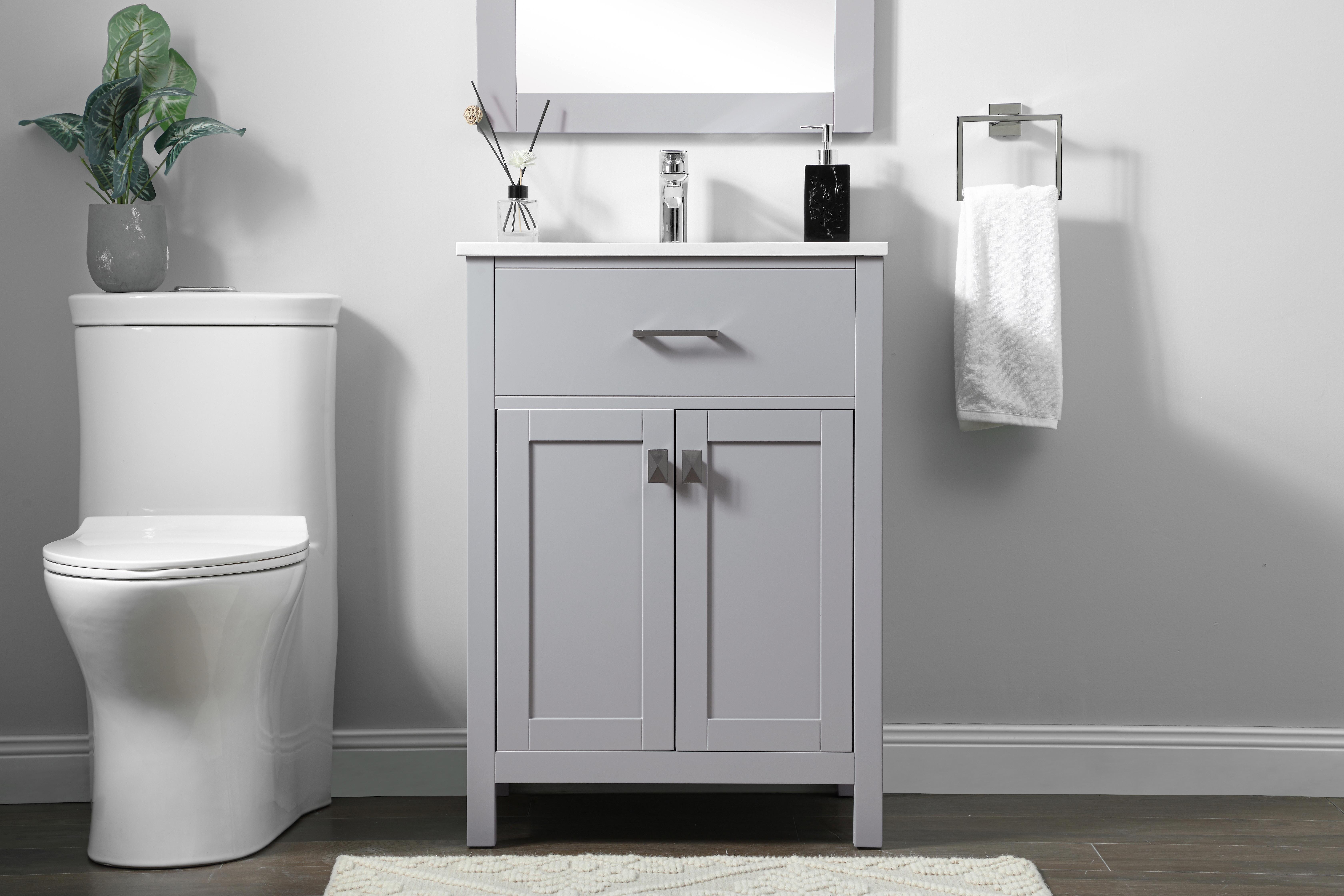 Dimensions
Length: 24"
Width: 19"
Height: 34"
Counter Top Length: 24"
Counter Top Width: 19"
Counter Top Height: 0.71"
Sink Width: 15.35"
Sink Depth: 10.24"
Sink Height: 8.25"
Sink Drain Hole Size: 1.77"
Faucet Hole Spacing: 1 Hole"
Specifications
Assembly Required: NO
Counter Top Edge Style: Straight
Counter Top Finish: Calacatta white
Distressed Finish: NO
Drain Assembly Included: NO
Faucet Included: NO
Finish (Color): Grey
Vanity Material: Solid Wood and MDF
Hardware Finish: brushed nickel
Harware Material: Aluminum alloy
Number of Faucet Holes: 1
Number of Sinks: 1
Product Shape: Rectangle
Product Type: Bathroom Vanities
Product Warranty: 1 year limited
Sink Mounting Type: Undermount
Vanity Backsplash: NO
Vanity Mounting Type: Free-Standing
Weight: 67
Wire Included: No
Wood Type: Rubberwood
Shipment type: Oversized Ground
US Shipping Cost: $129.00
Drawers
Drawers Included: NO
Number of Drawers: 0
False Drawers: YES
Cabinets
Number of Cabinets: 1
Cabinet Interior Width: 21.06
Cabinet Interior Depth: 17.24
Cabinet Interior Height: 27.83 - alternate view