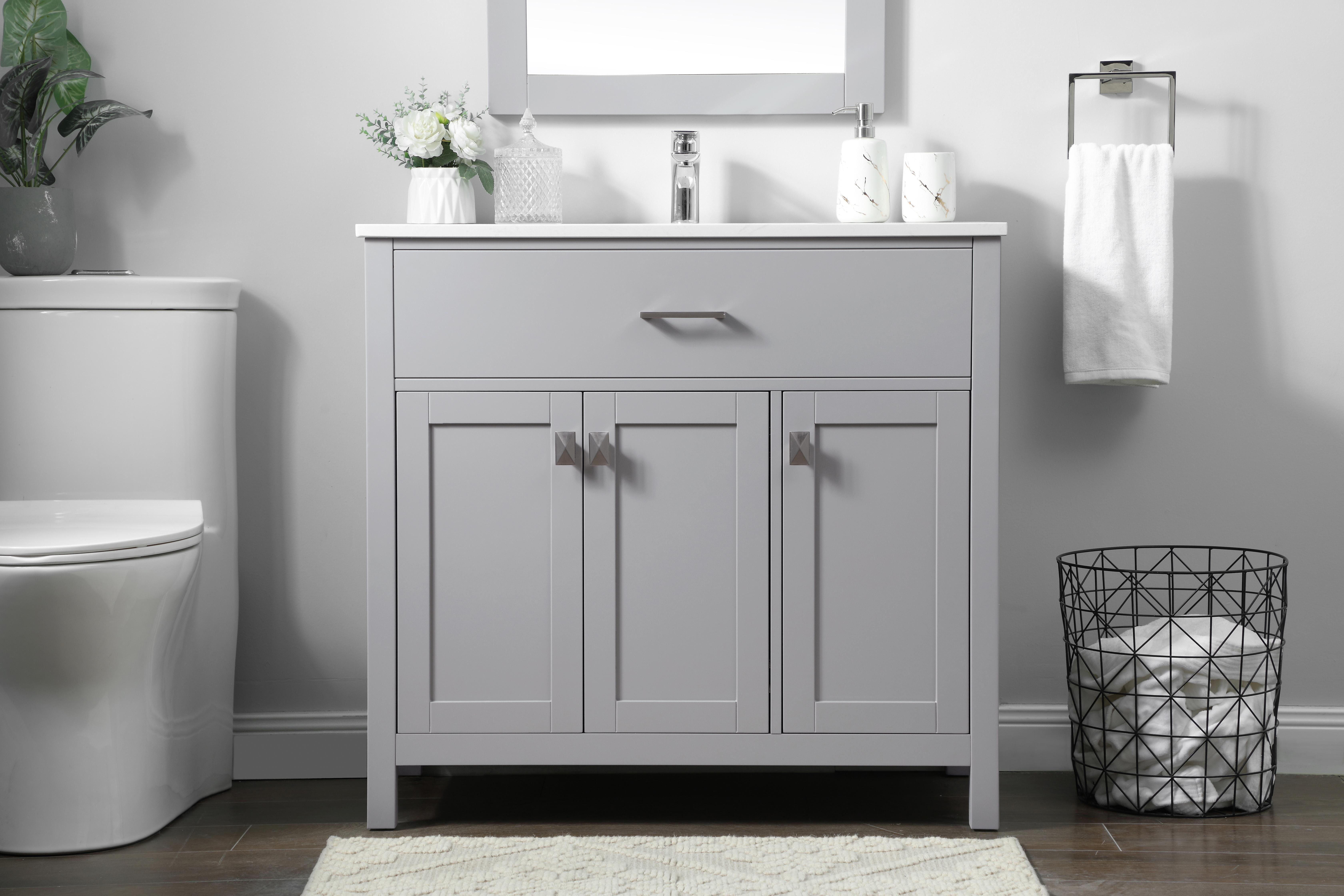 Dimensions
Length: 36"
Width: 19"
Height: 34"
Counter Top Length: 36"
Counter Top Width: 19"
Counter Top Height: 0.71"
Sink Width: 15.35"
Sink Depth: 10.24"
Sink Height: 8.25"
Sink Drain Hole Size: 1.77"
Faucet Hole Spacing: 1 Hole"
Specifications
Assembly Required: NO
Counter Top Edge Style: Straight
Counter Top Finish: Calacatta white
Distressed Finish: NO
Drain Assembly Included: NO
Faucet Included: NO
Finish (Color): Grey
Vanity Material: Solid Wood and MDF
Hardware Finish: brushed nickel
Harware Material: Aluminum alloy
Number of Faucet Holes: 1
Number of Sinks: 1
Product Shape: Rectangle
Product Type: Bathroom Vanities
Product Warranty: 1 year limited
Sink Mounting Type: Undermount
Vanity Backsplash: NO
Vanity Mounting Type: Free-Standing
Weight: 104
Wire Included: No
Wood Type: Rubberwood
Shipment type: LTL
US Shipping Cost: $159.00
Drawers
Drawers Included: NO
Number of Drawers: 0
False Drawers: YES
Cabinets
Number of Cabinets: 2
Cabinet Interior Width: 21.48,
11
Cabinet Interior Depth: 17.24
Cabinet Interior Height: 27.83 - alternate view