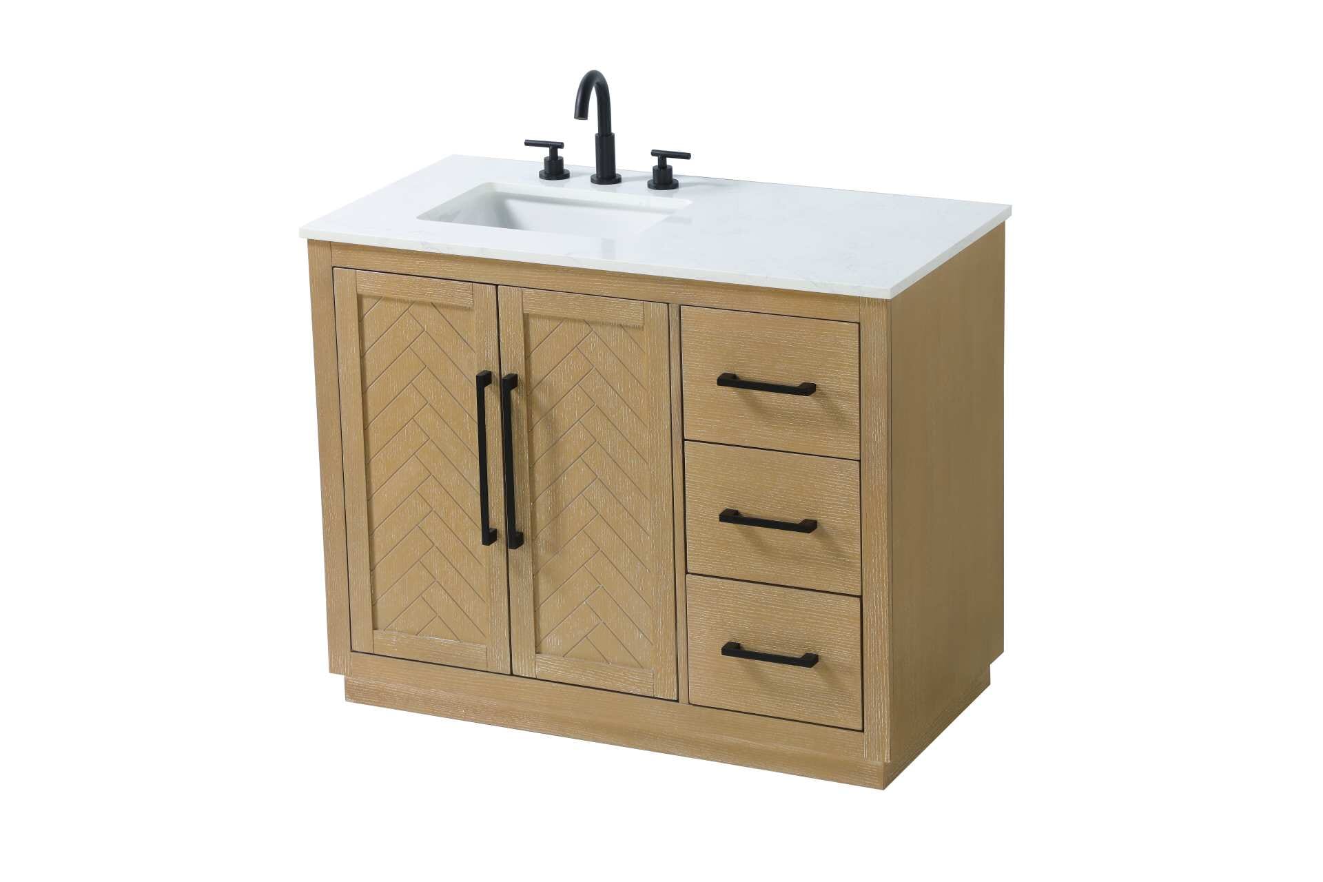 This transitional bathroom vanity offers the perfect blend of timeless style and modern functionality. Available in five refined finishes—crisp white, sleek grey, chocolate oak, honey oak, and linen oak—it complements a range of decor styles, from classic to contemporary. The stunning herringbone design on the Shaker-style door panels adds texture and craftsmanship to the piece. Topped with a white engineered marble countertop featuring subtle veining, it provides both beauty and durability. The long black metal pulls on the soft-closing doors and the thin bar pulls on the drawers add sleek, modern detailing. Practical features include a concealed overflow, a back panel cutout for easy plumbing installation, and a U-shaped cutout shelf to fit plumbing while maximizing storage space. With a toe kick all around the base, this vanity is thoughtfully designed to blend form and function in any bathroom setting. Collection: Chase Rooms: bathroom Finish: Linen Oak Width: 21.50" Height: 34.00" Length: 42.00" Weight: 172.00 lb Material: Solid wood and MDF Country of Origin: Vietnam Manufacturer Warranty: 1 year limited - alternate view