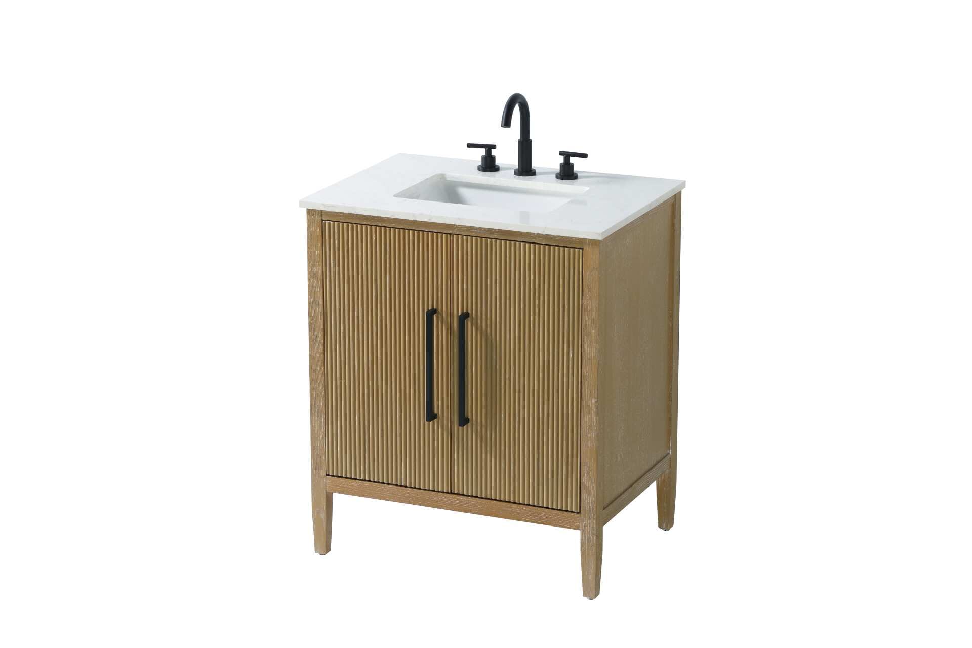 Designed with transitional elegance in mind, this bathroom vanity seamlessly blends traditional elements with modern functionality. Available in five stunning finishes, from the clean sophistication of Crisp White to the natural warmth of Honey Oak, the fluted door and drawer panels add subtle texture and charm. The white engineered marble countertop with natural veining exudes luxury, while the soft-closing doors with sleek black metal pulls offer a quiet, refined experience. Practicality is never compromised, with features like the U-shaped shelf for plumbing, and pre-drilled faucet holes for easy customization. Whether your style leans modern or classic, this vanity is the perfect balance of beauty and function, appealing to customers with a taste for quality and style. Collection: Blakely Rooms: bathroom Finish: Linen Oak Width: 21.50" Height: 35.00" Length: 30.00" Weight: 96.00 lb Material: Solid wood and MDF Country of Origin: Vietnam Manufacturer Warranty: 1 year limited - alternate view