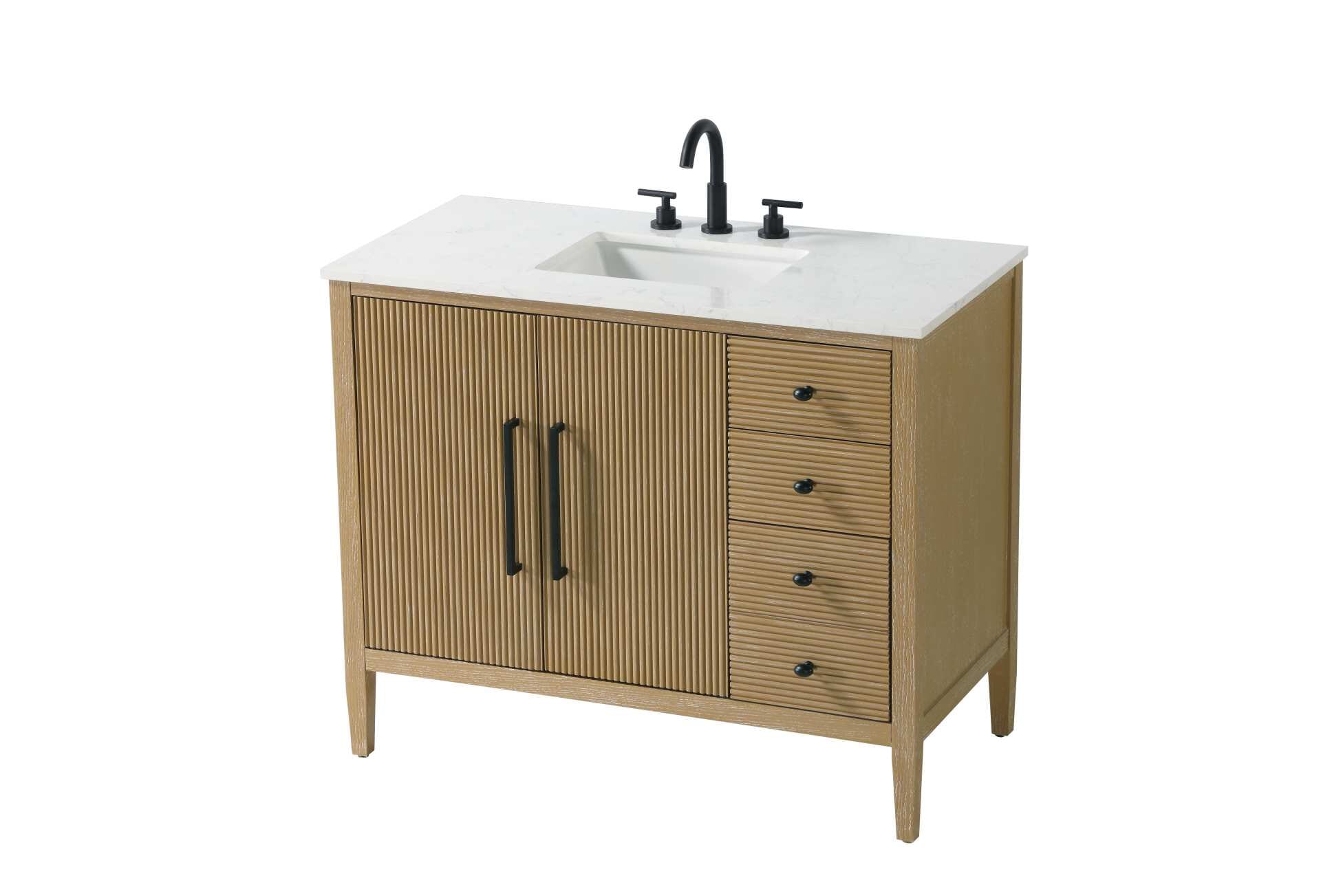 Designed with transitional elegance in mind, this bathroom vanity seamlessly blends traditional elements with modern functionality. Available in five stunning finishes, from the clean sophistication of Crisp White to the natural warmth of Honey Oak, the fluted door and drawer panels add subtle texture and charm. The white engineered marble countertop with natural veining exudes luxury, while the soft-closing doors and drawers with sleek black metal pulls offer a quiet, refined experience. Practicality is never compromised, with features like the U-shaped shelf for plumbing, deeper bottom drawer for ample storage, and pre-drilled faucet holes for easy customization. Whether your style leans modern or classic, this vanity is the perfect balance of beauty and function, appealing to customers with a taste for quality and style. Collection: Blakely Rooms: bathroom Finish: Linen Oak Width: 21.50" Height: 34.00" Length: 42.00" Weight: 158.00 lb Material: Solid wood and MDF Country of Origin: Vietnam Manufacturer Warranty: 1 year limited - alternate view