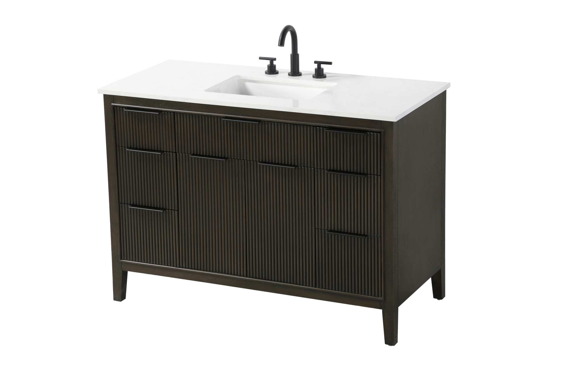 Specification Sheet
Dimensions
Length: 48"
Width: 22"
Height: 34"
Counter Top Length: 48"
Counter Top Width: 22"
Counter Top Height: 0.75"
Sink Width: 17.125"
Sink Depth: 11.625"
Sink Height: 7"
Sink Drain Hole Size: 1.75"
Faucet Hole Spacing: 8"3 Holes"
Specifications
Assembly Required: NO
Base Material: Solid wood and MDF
Counter Top Edge Style: straight
Counter Top Finish: Marble White
Distressed Finish: NO
Drain Assembly Included: NO
Faucet Included: NO
Faucet Type: Widespread
Finish (Color): Chocolate Oak
Vanity Material: Solid Wood and MDF
Hardware Finish: black
Harware Material: Aluminum alloy
Number of Faucet Holes: 3
Number of Sinks: 1
Product Shape: Rectangle
Product Type: Bathroom Vanities
Product Warranty: 1 year limited
Sink Mounting Type: Undermount
Vanity Backsplash: NO
Vanity Mounting Type: Free-Standing
Weight: 202
Wire Included: No
Wood Type: Rubberwood
Shipment type: LTL
Drawers
Drawers Included: yes
Number of Drawers: 7
False Drawers: NO
Drawer Width: dw1: 22.5
dw2: 10.125
dw3: 10.125
Drawer Depth: dw1: 3.625
dw2: 15.125
dw3: 15.125
Drawer Height: dw1: 6.125
dw2: 6.125
dw3: 9
Drawer Handle Designs: Finger pulls
Shelves
Number of Shelves: 1
Shelf Width: 22.5
Cabinets
Number of Cabinets: 1
Cabinet Interior Width: 22.5
Cabinet Interior Depth: 16.875
Cabinet Interior Height: 18.125 - alternate view